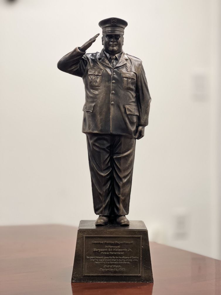 Scaled Down Replica Of Sgt Ed Holcombs Bronze Statue A Symbol Of Valor At Conroe Police Department