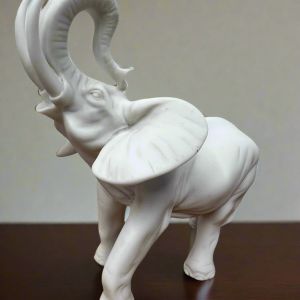 White Bonded Marble statue of elephant with trunk up in the air